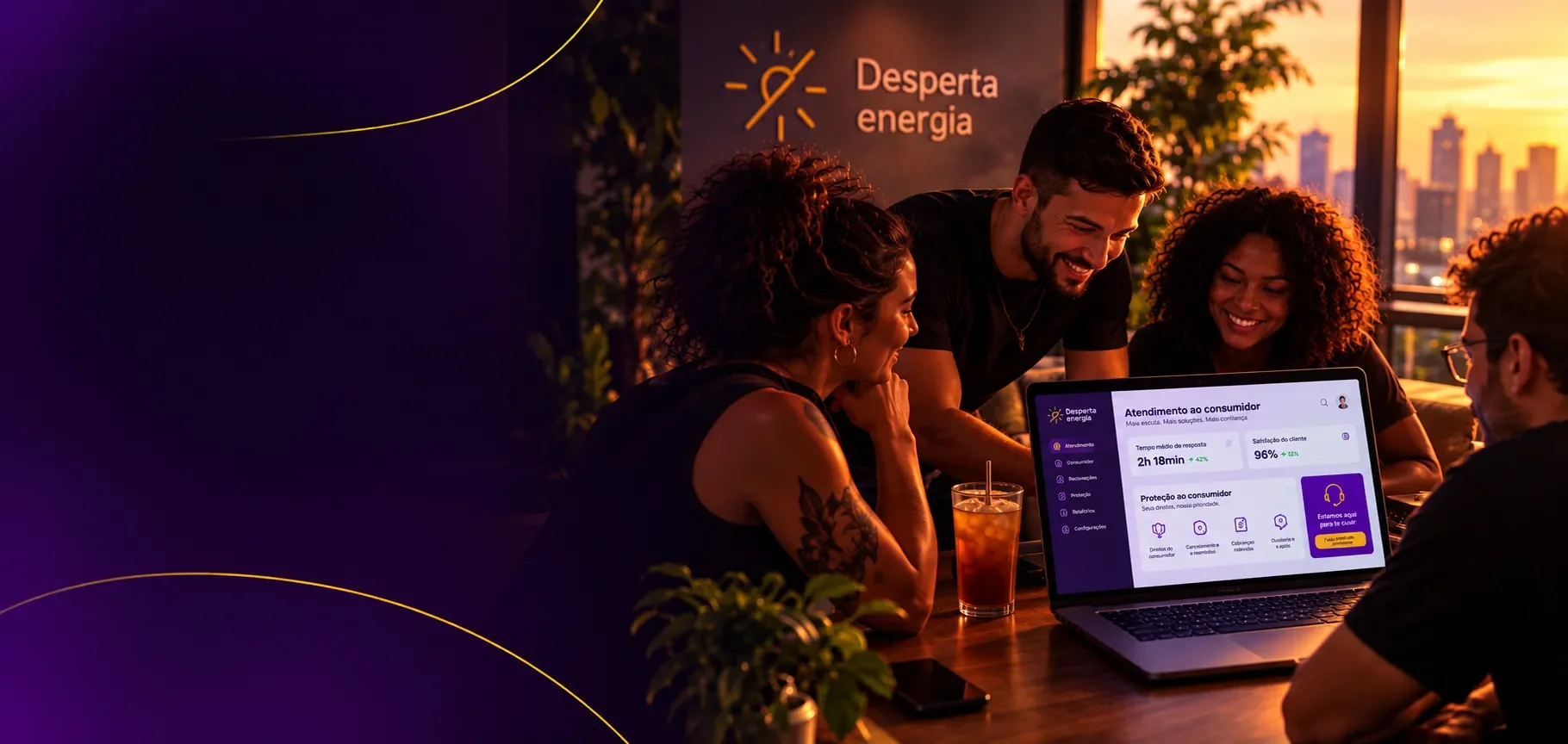 Desperta Energia team gathered around a laptop at sunset